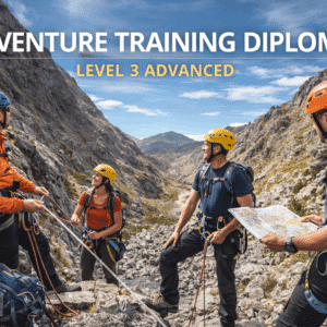 Adventure Training Diploma Level 3 showing outdoor instructors leading a climbing and rope training session in a mountain setting