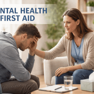 Mental Health First Aid training showing a support worker listening compassionately to a person in a calm wellbeing environment